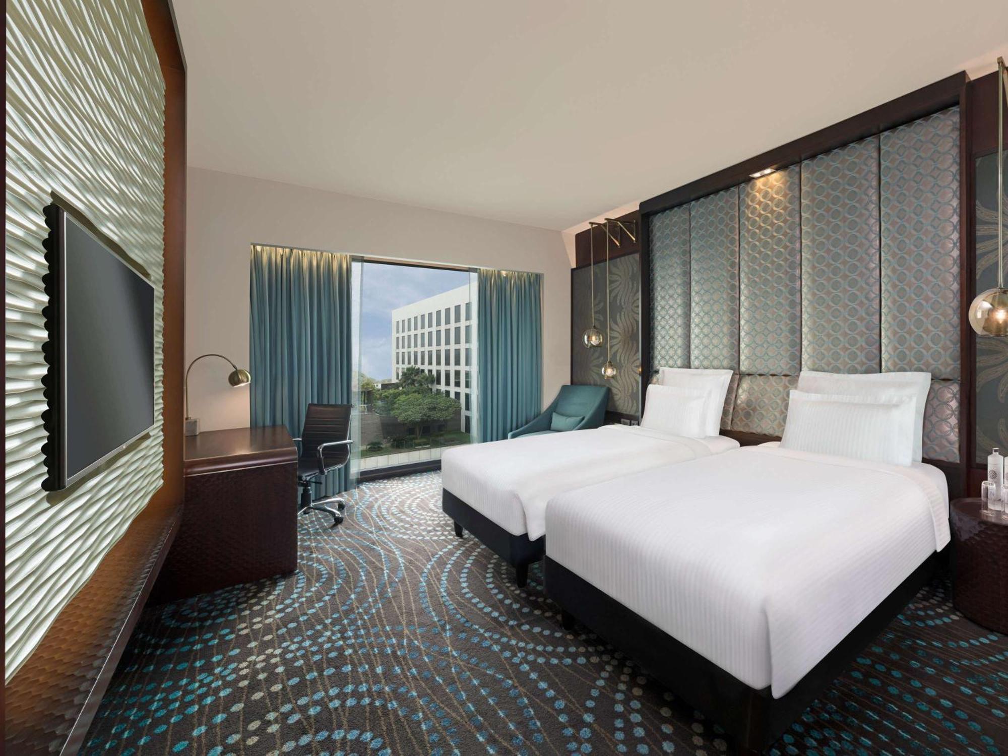 Pullman New Delhi Aerocity Kültér fotó Deluxe Room